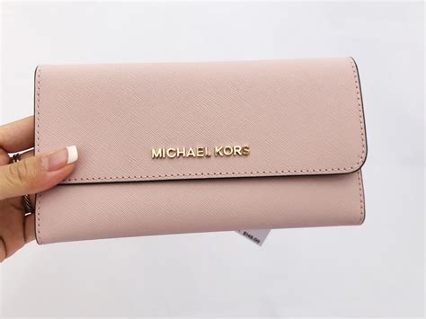 michael kors travel wallet pink|Michael Kors large trifold wallet.